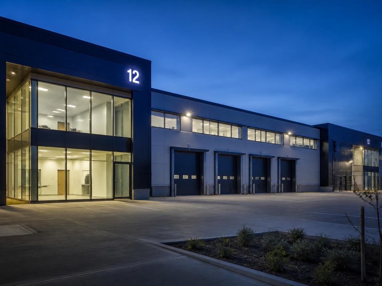 Industrial business park unit exterior at dusk